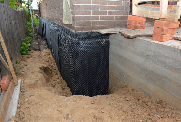 SJ Waterproofing Pros technician performing targeted Emergency Waterproofing assessment in Gallant, AL